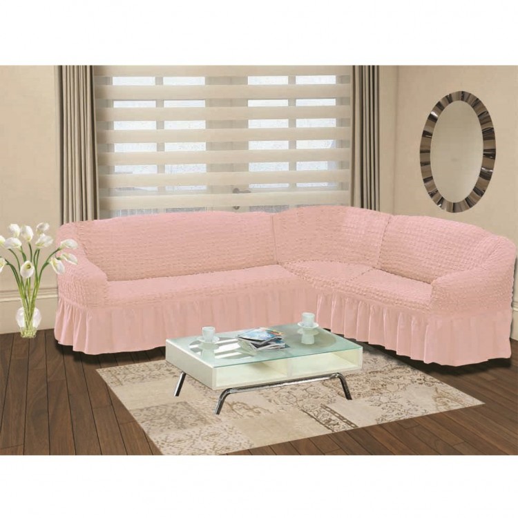 Угловой провостороний чехол на диван розовый